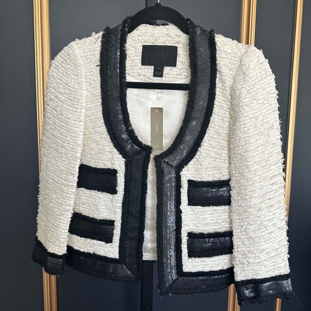 White twill with black sequent boarder.